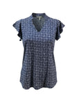 The Strawberry Shop navy and white geometric print knit short sleeve Sevilla top with V-neck and flutter sleeves.