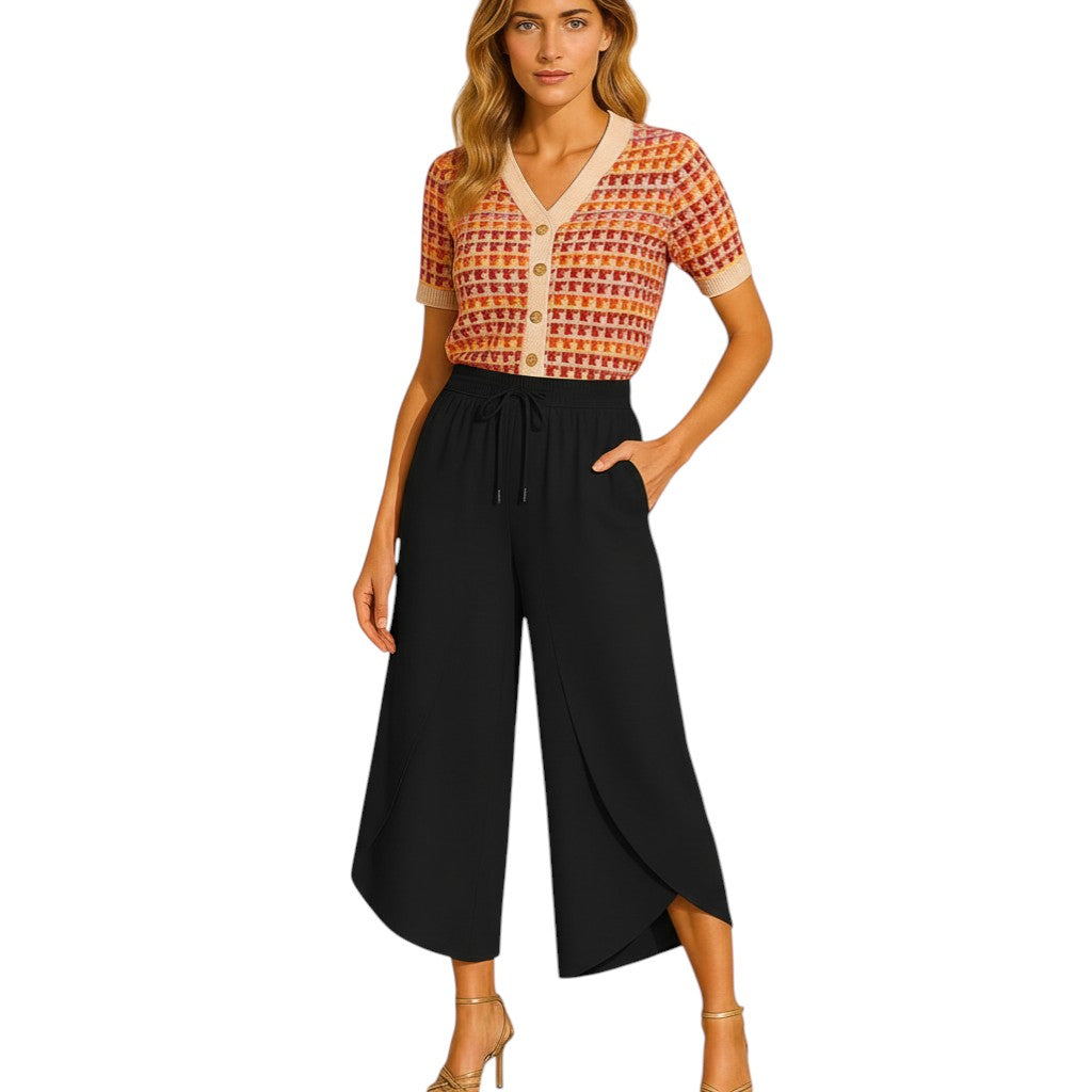 The Strawberry Shop Orly flowy cropped orange polyester pants with drawstring waist and side pockets.