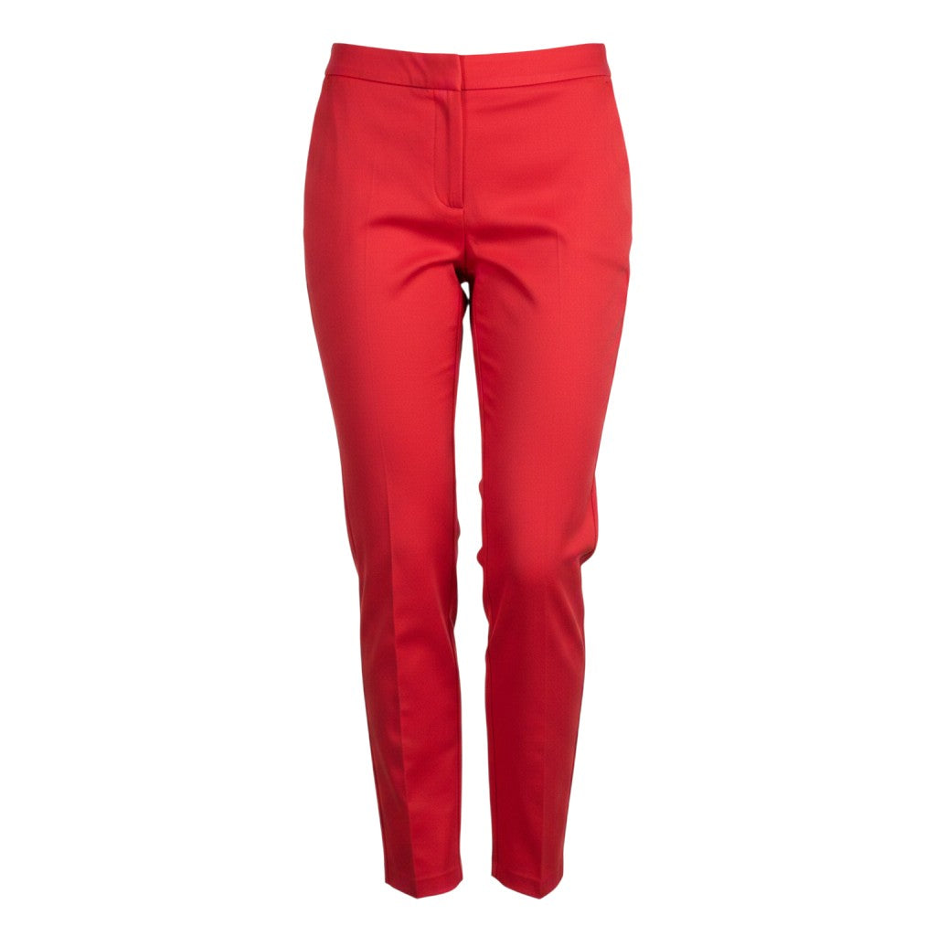 The Strawberry Shop red foil pants with a comfortable elastic waistband and a slim fit.
