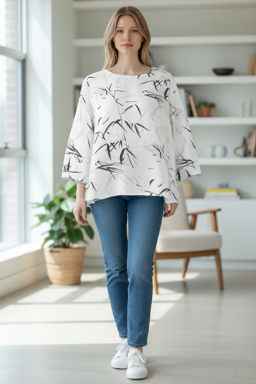 The Strawberry Shop white 3/4 sleeve top with a black and grey bamboo print and round neck.