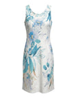 The Strawberry Shop white sleeveless dress with a blue floral print and a scalloped neckline. Lightweight fabric with a mesh hem.