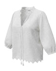 The Strawberry Shop white 100% cotton FOIL Love Weave Top with V-neck, ruffle, tie detail, and 3/4 sleeves.