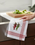 The Strawberry Shop white waffle weave kitchen towel with red stripes and embroidered dancing chili peppers wearing sombreros.