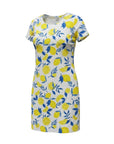 The Strawberry Shop white cotton shift dress with a yellow lemon and blue leaf print. Knee-length with cap sleeves.