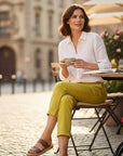 The Strawberry Shop yellow cropped trousers with side slit hem. These Foil pants are a versatile addition to any wardrobe.
